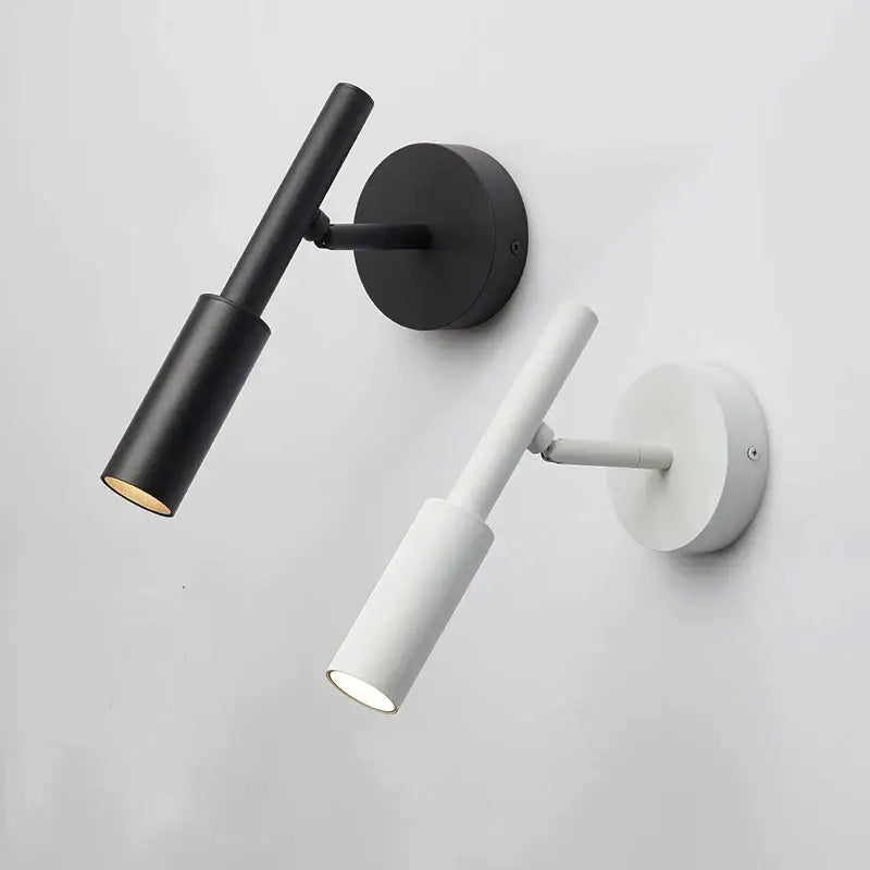 Modern matte black adjustable led wall lamp with cylindrical shades for bedroom reading light in minimalist design