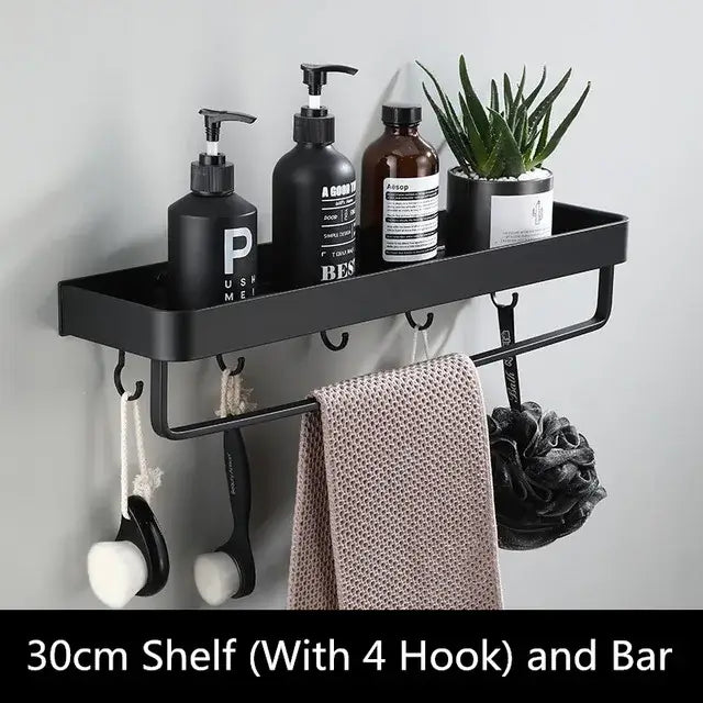 Modern matte black aluminum corner shelf with four hooks and bar holding toiletries and plant for black aluminum bathroom storage