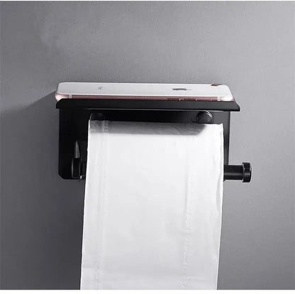 Modern matte black aluminum paper holder with sleek design holding white tissue roll for black aluminum bathroom decorbites