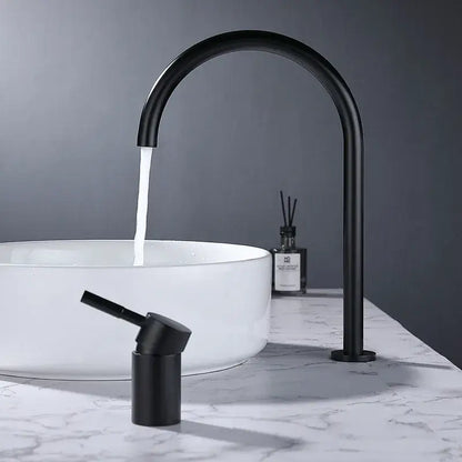 Modern matte black basin faucet with curved spout and separate handle on white vessel sink for bathroom decorbites black basin