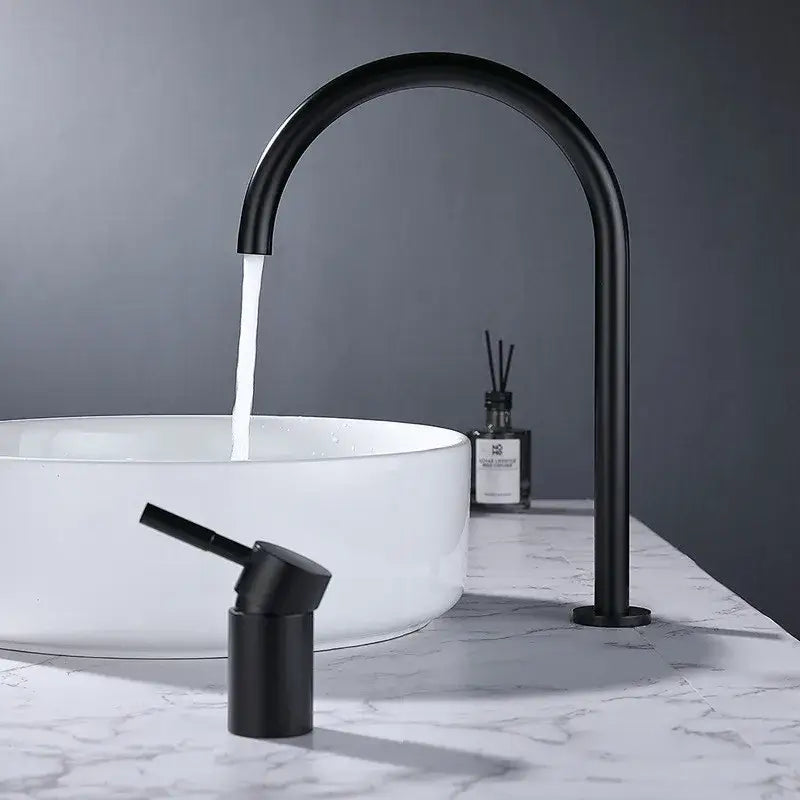 Modern matte black basin faucet with curved spout and separate handle on white vessel sink for bathroom decorbites black basin
