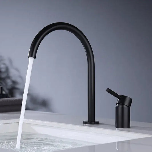 Modern matte black and brushed gold basin faucet with sleek curved spout minimalist design decorbites black basin faucet