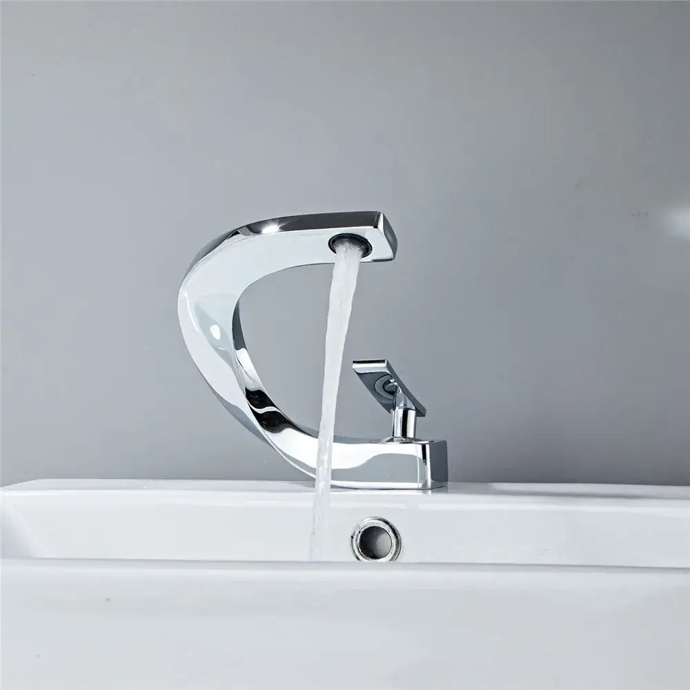 Modern chrome basin faucet with sleek curved design and single lever handle suitable for decorbites black basin faucet