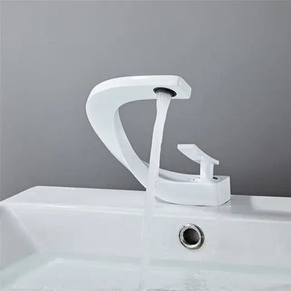 Modern white ceramic basin faucet with sleek curved design and minimalist handle for decorbites black basin faucet