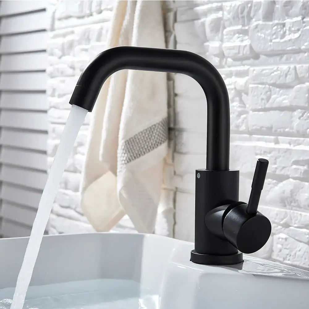 Modern matte black basin faucet with curved spout and single lever handle by decorbites black basin for bathroom use
