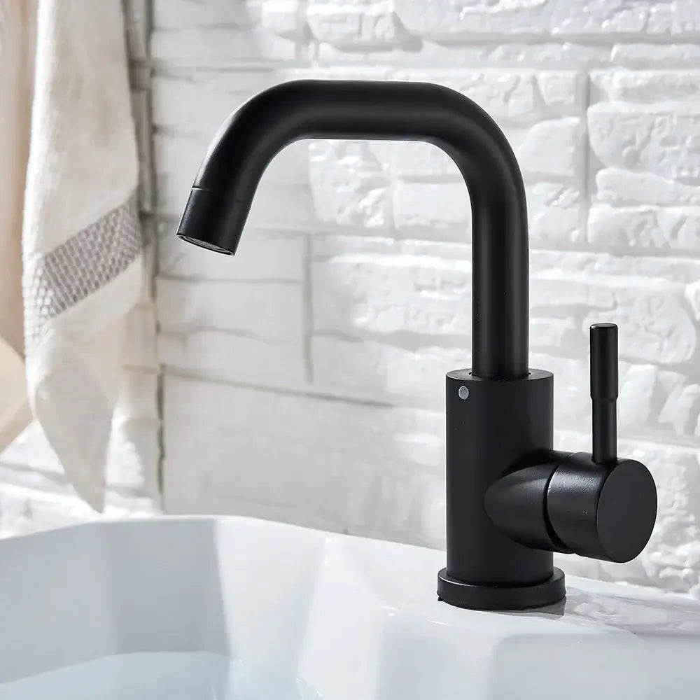 Modern matte black basin faucet with sleek curved spout and cylindrical handle by decorbites black basin faucet