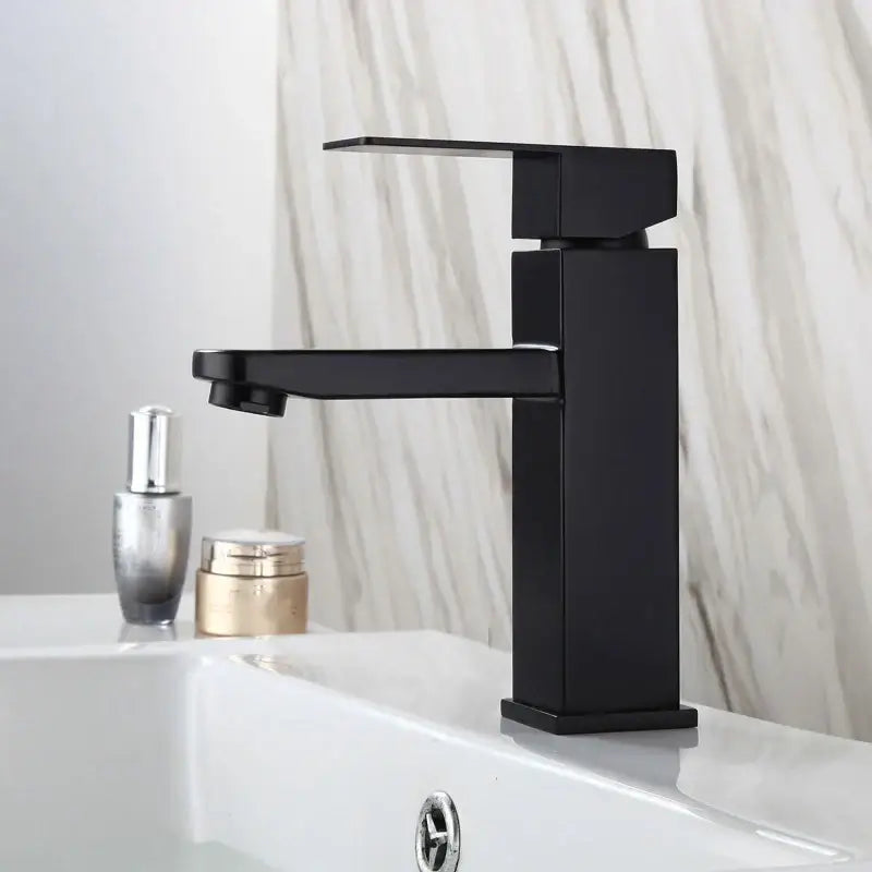 Modern matte black basin faucet with angular geometric design and single handle mixer by decorbites black basin faucet