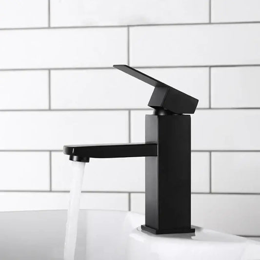 Modern matte black basin faucet with angular design and single lever handle by decorbites black basin faucet