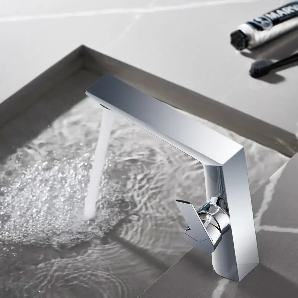 Modern chrome-finished basin faucet with sleek angular design and single lever handle for decorbites black basin faucet use