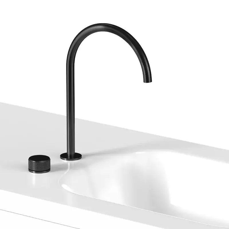 Modern matte black basin faucet with a sleek curved spout and cylindrical handle for bathroom sink decorbites black basin