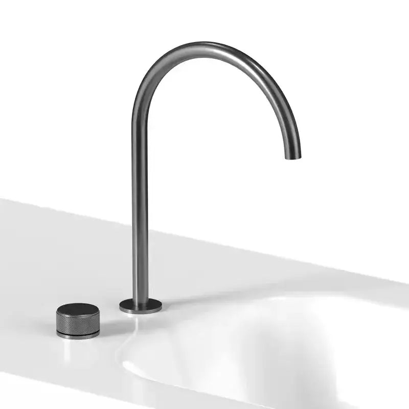 Modern matte black basin faucet with sleek curved spout and textured cylindrical handle for bathroom sink decorbites black basin