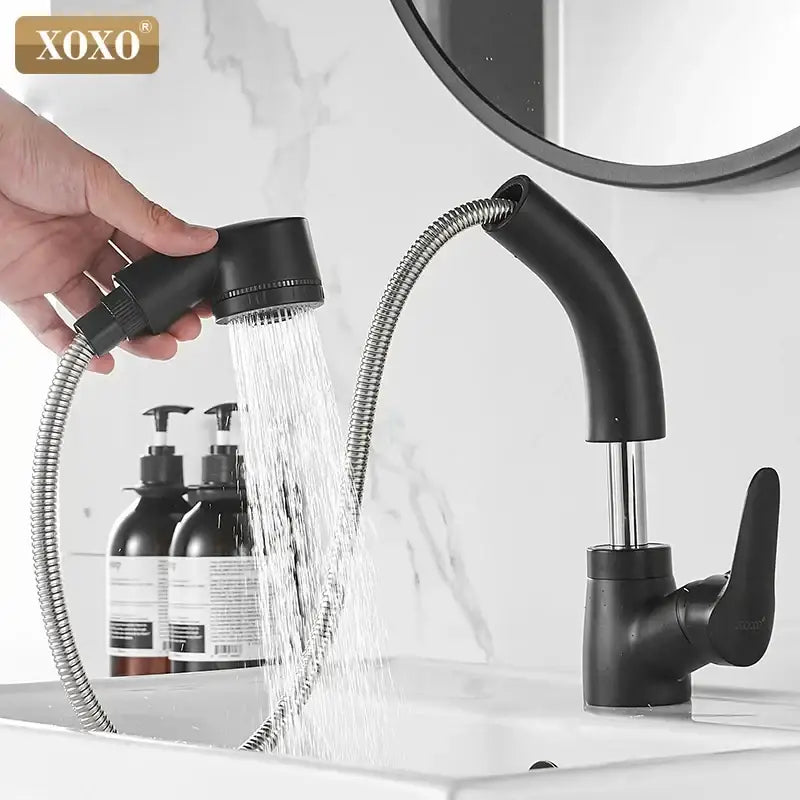 Modern matte black basin faucet with flexible gooseneck hose and detachable spray head by decorbites black basin faucet
