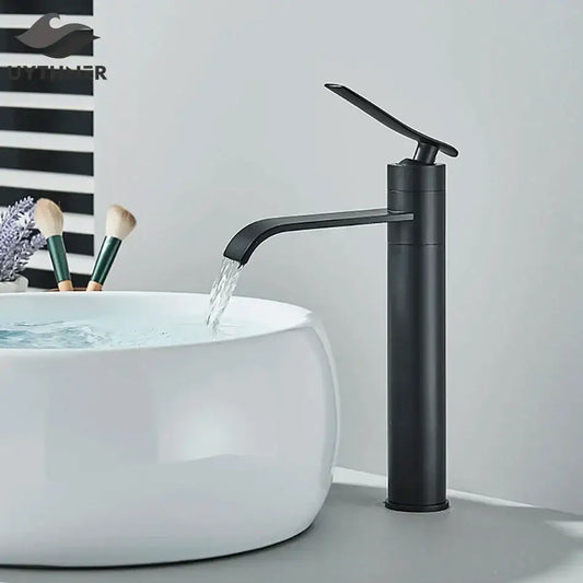Modern matte black basin faucet mixer with curved spout flowing water into white ceramic sink decorbites basin faucet