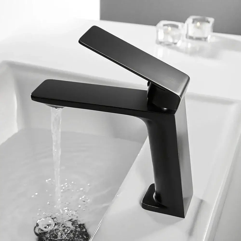 Modern matte black basin faucet mixer tap with angular design and sleek minimalist profile for bathroom use
