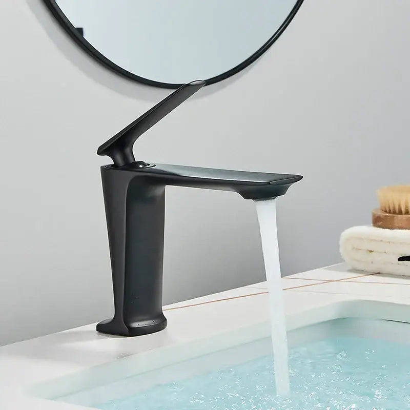 Modern matte black basin mixer with sleek angular design and black matte finish for bathroom vanity decorbites black basin