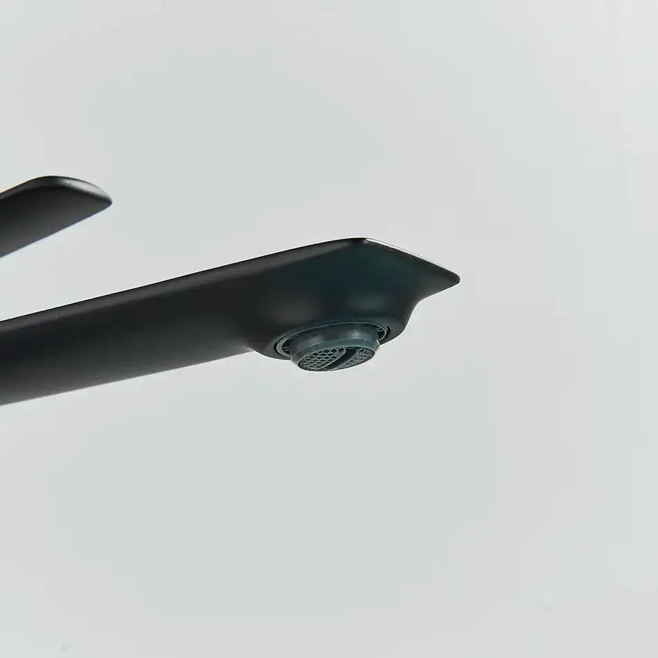 Modern matte black basin mixer bathroom vanity tap with sleek angular design and circular spray nozzle decorbites black basin
