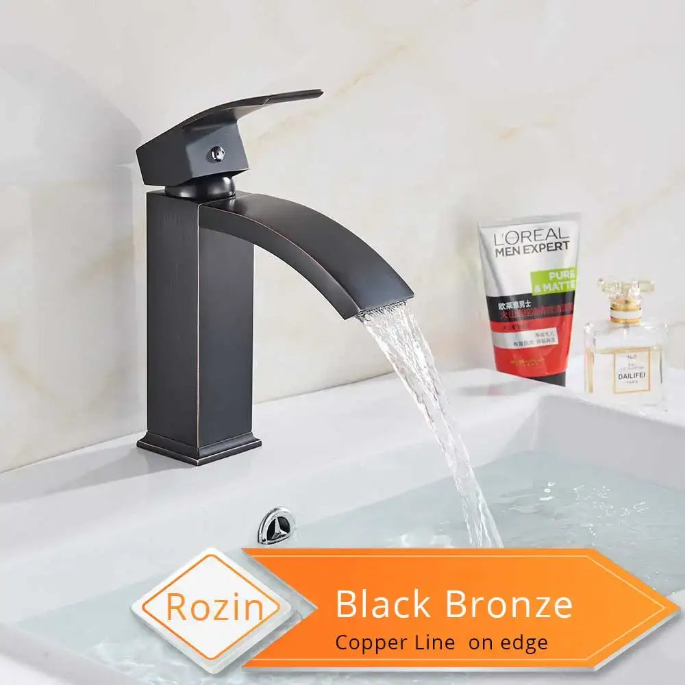 Modern matte black basin mixer faucet with sleek curved spout and copper-lined edges for bathroom use