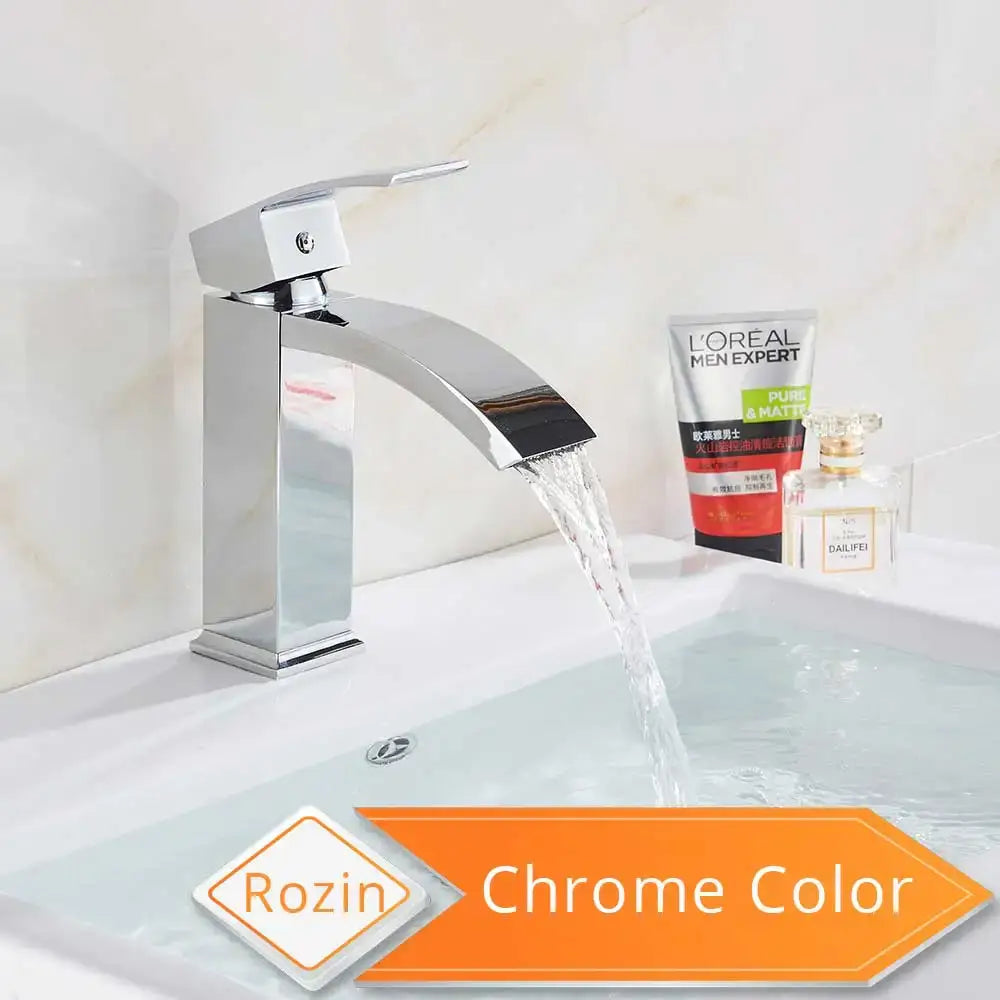 Chrome-finished rozin basin mixer faucet with a sleek modern design and arched spout for bathroom use