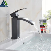 Modern matte black basin mixer faucet with sleek curved spout and single lever handle for bathroom use