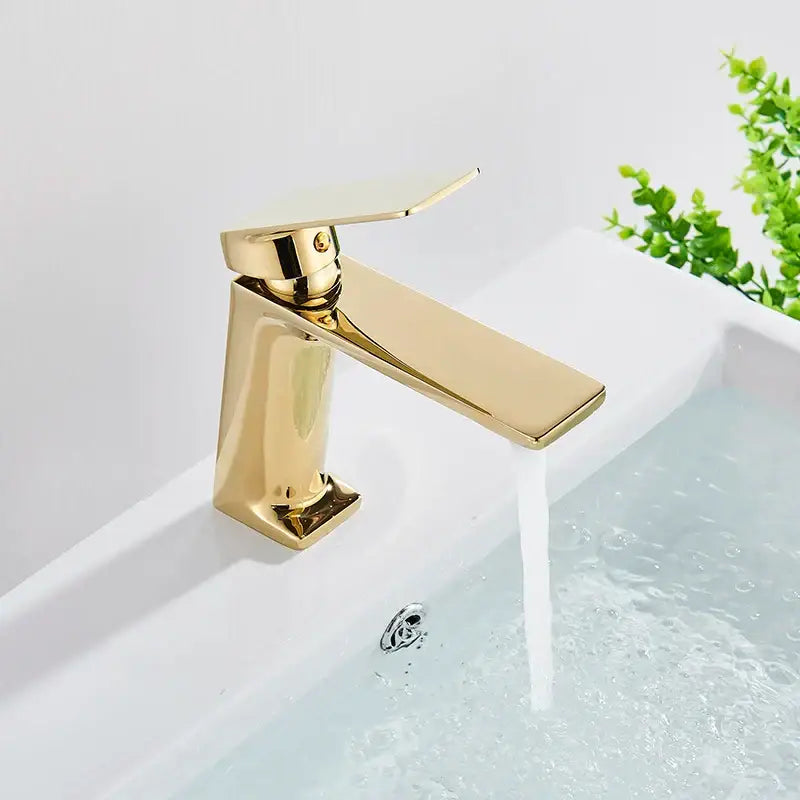 Gold-toned modern faucet with sleek rectangular design and polished finish for decorbites black basin mixer tap