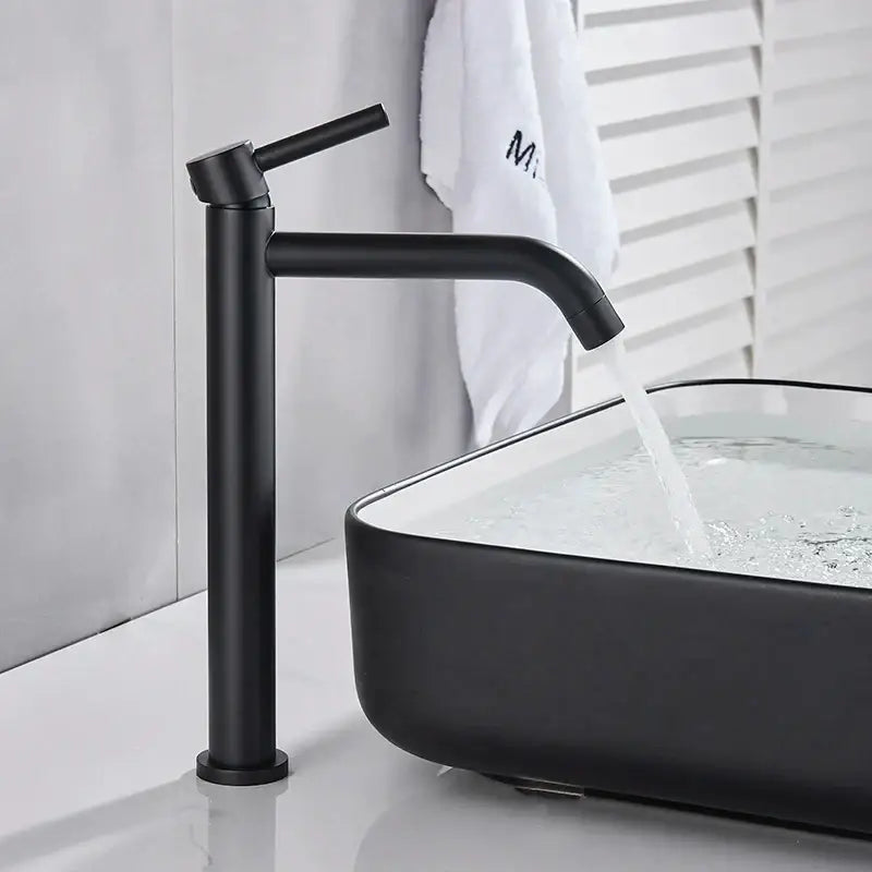 Modern matte black basin mixer tap with sleek minimalist design and single lever for bathroom use