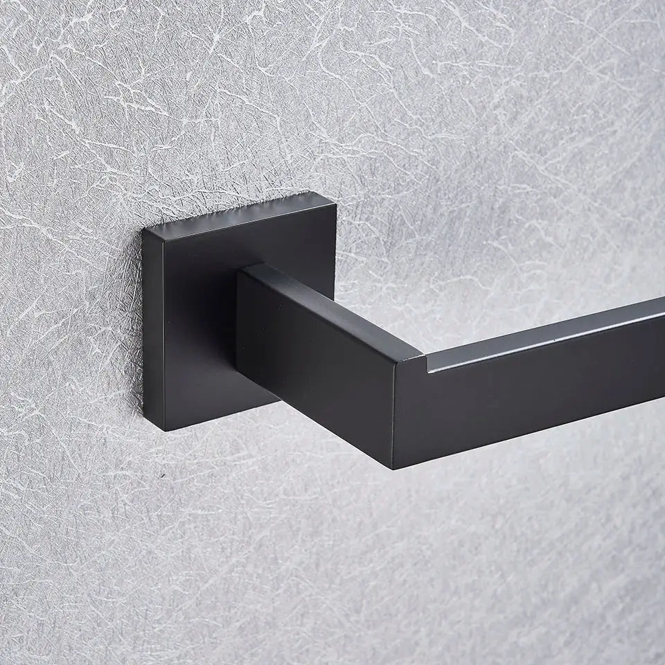 Modern matte black bathroom accessories set featuring a black matte-finished metal towel rack with square base for decorbites black bathroom