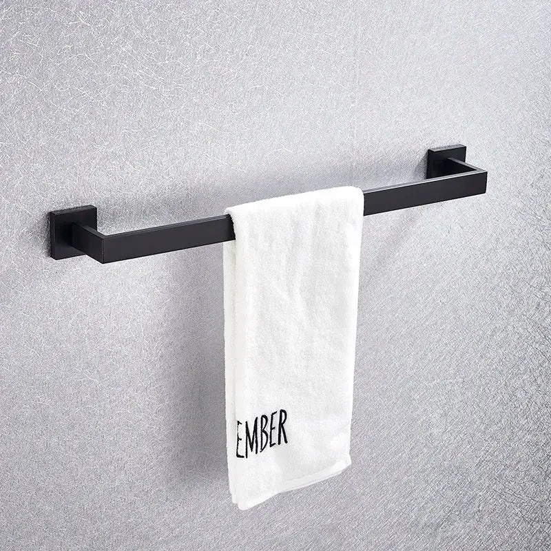 Modern matte black bathroom accessories set featuring a sleek black matte-finished metal towel rack for decorbites black bathroom