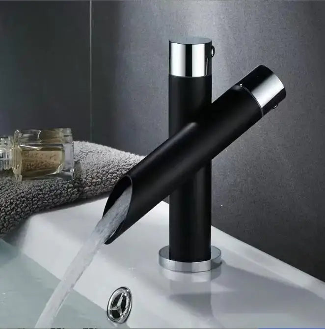 Modern matte black bathroom faucet set with chrome waterfall spout and sleek cylindrical design for bathroom faucet use