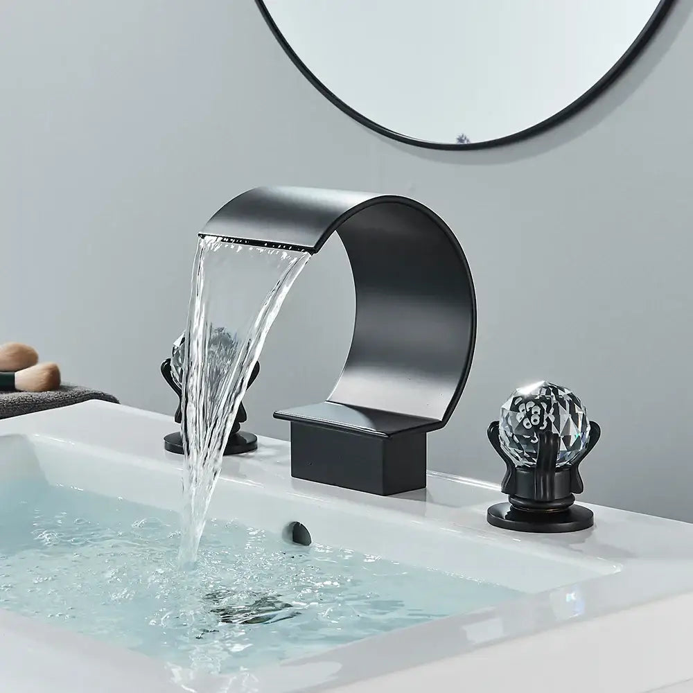 Modern matte black bathroom faucet set with black matte waterfall spout and crystal knob accents bathroom faucet set