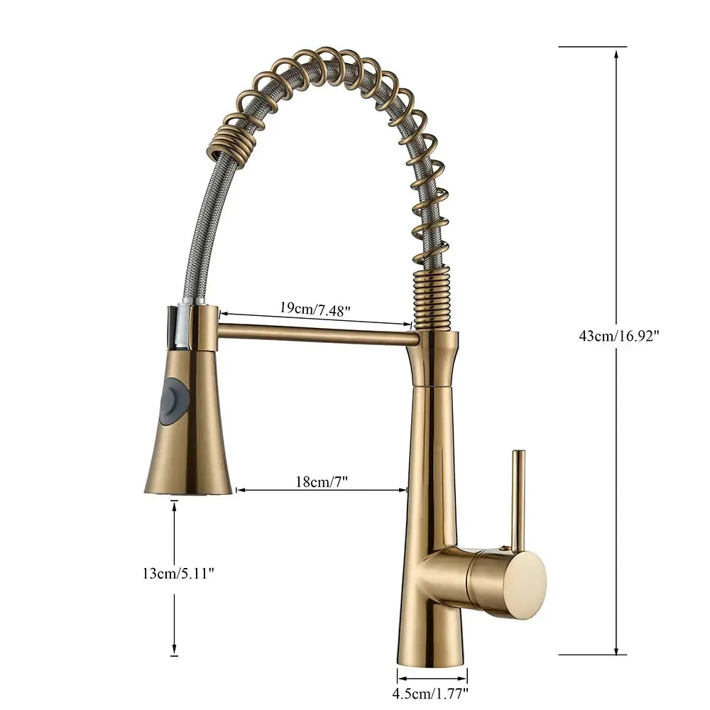 Gold-toned kitchen faucet with flexible coiled hose and modern design in a bathroom faucet set for sleek spout use