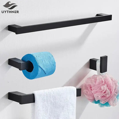 Modern matte black bathroom hardware set featuring a black matte metal towel rack with square ends and sleek design