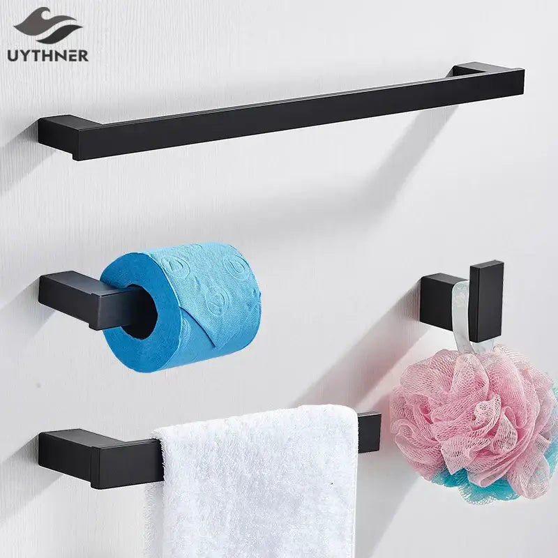 Modern matte black bathroom hardware set featuring a black matte metal towel rack with square ends and sleek design
