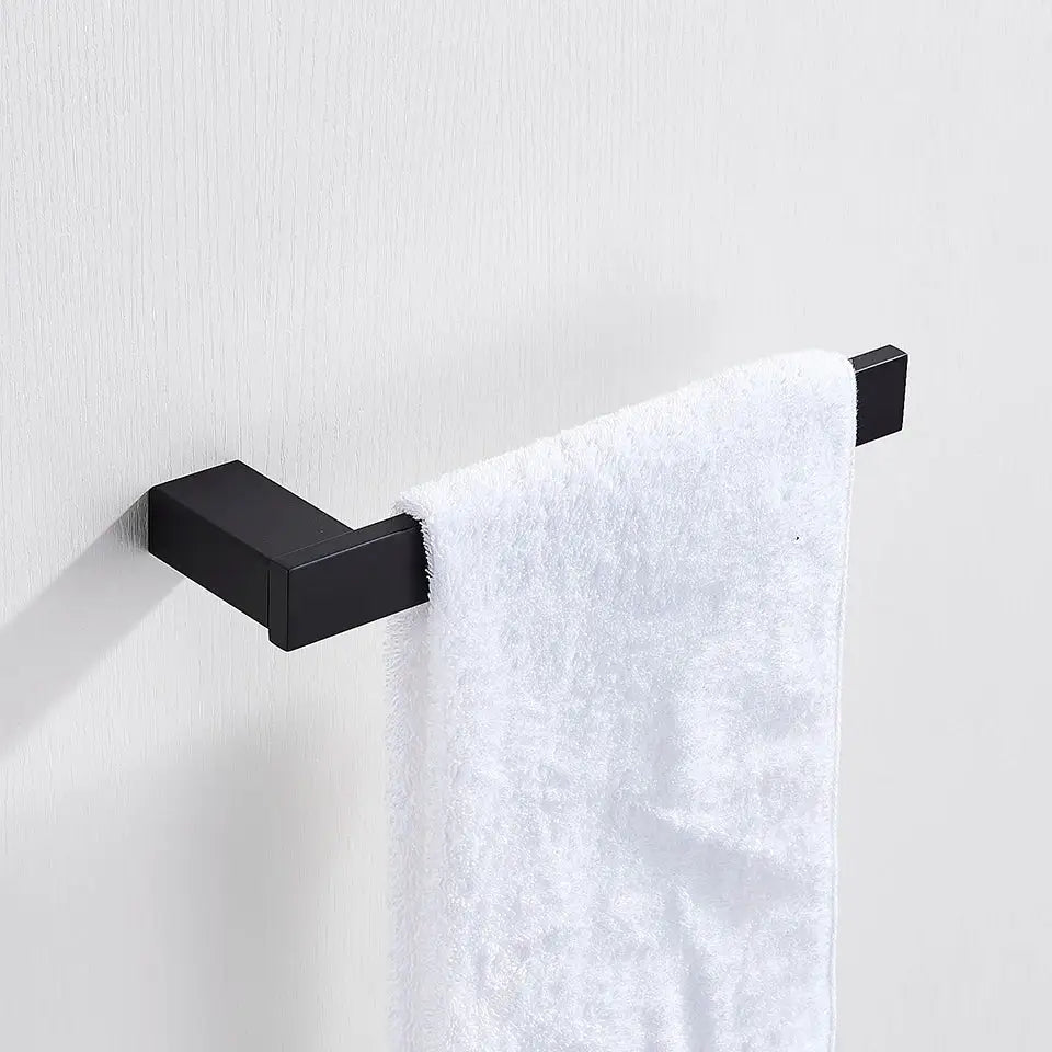 Modern matte black bathroom hardware set square metal towel rack with matte finish holding white plush towel