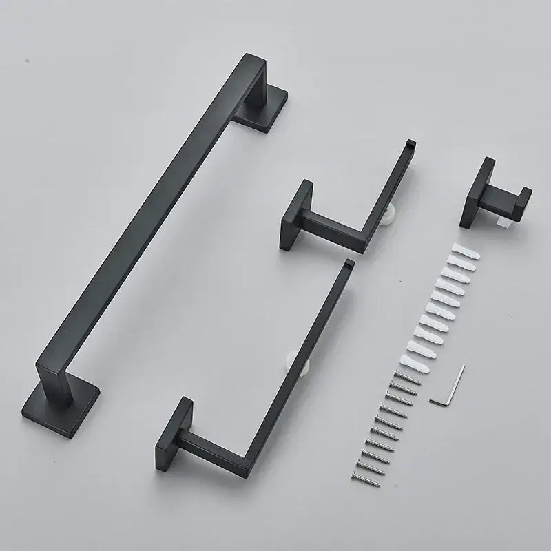 Modern matte black bathroom set featuring a black matte-finished metal towel rack with matching hooks and hardware decorbites black bathroom