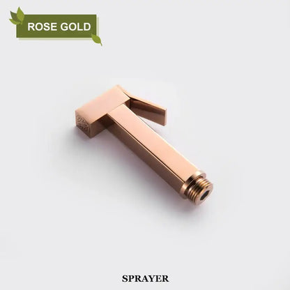 Rose gold handheld bidet faucet shower sprayer with sleek rectangular design and brushed metal finish for bathroom use