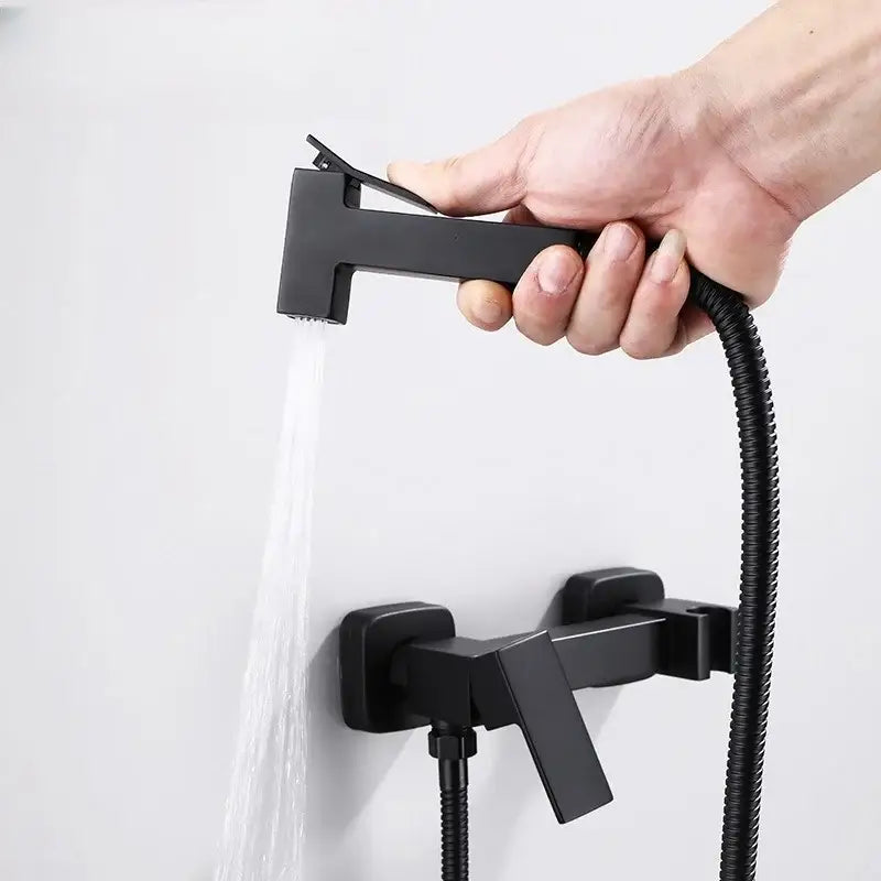 Modern matte black bidet spray gun set with black matte handheld showerhead and flexible hose wall-mounted faucet assembly