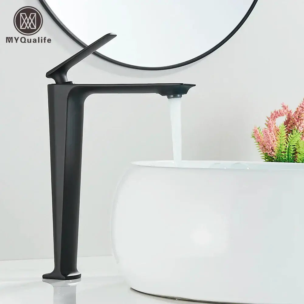 Modern matte black brass bathroom sink faucet with sleek angular design from decorbites black brass collection