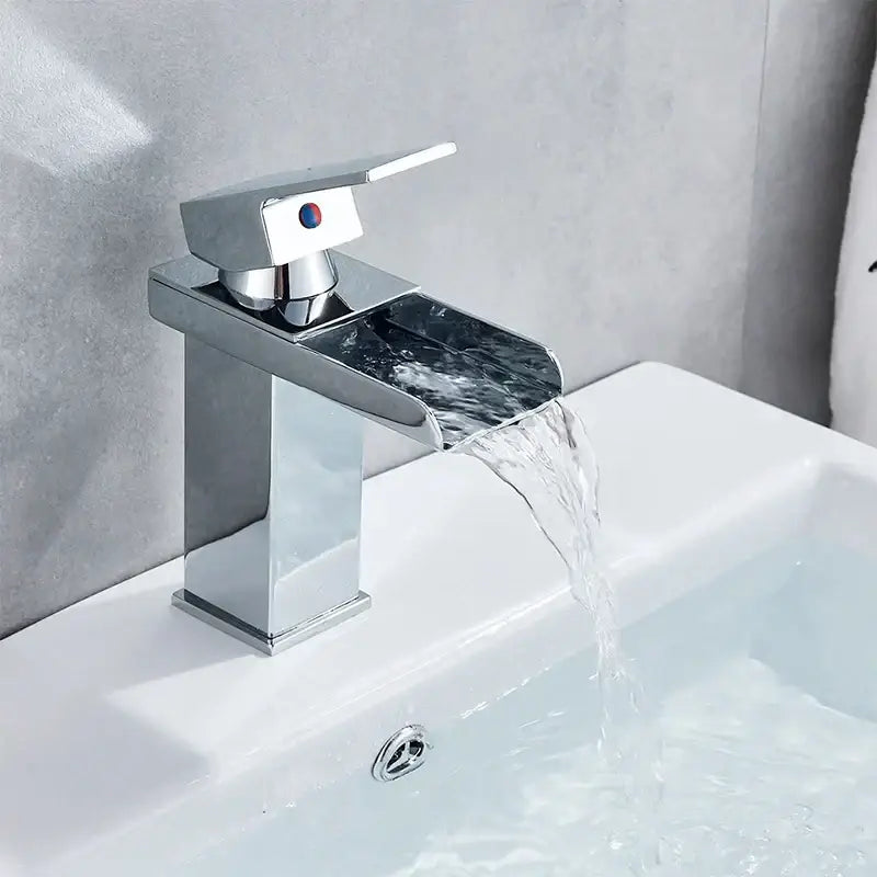 Modern chrome waterfall faucet with sleek rectangular design and single lever handle for black brass bathroom decorbites