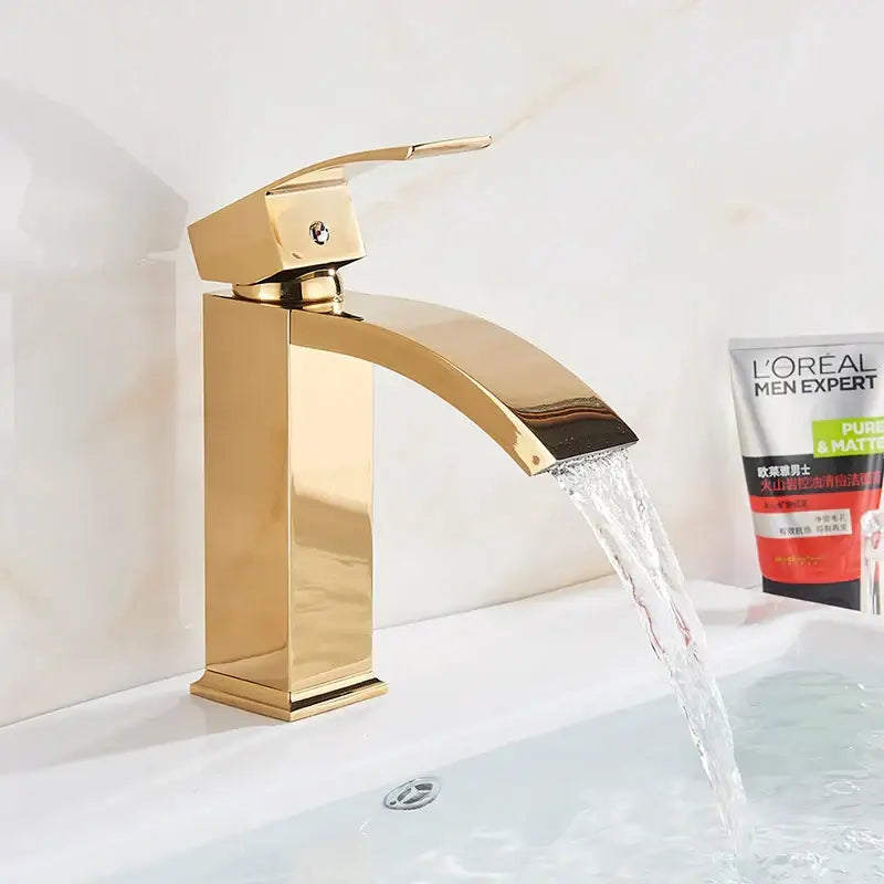 Modern matte black brass bathroom waterfall sink faucet with gold-toned sleek rectangular decorbites black brass design