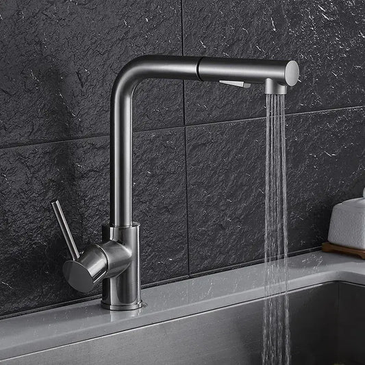 Modern matte black brass brushed nickel kitchen faucet with sleek curved spout and pull-down spray for brushed nickel kitchen decorbites