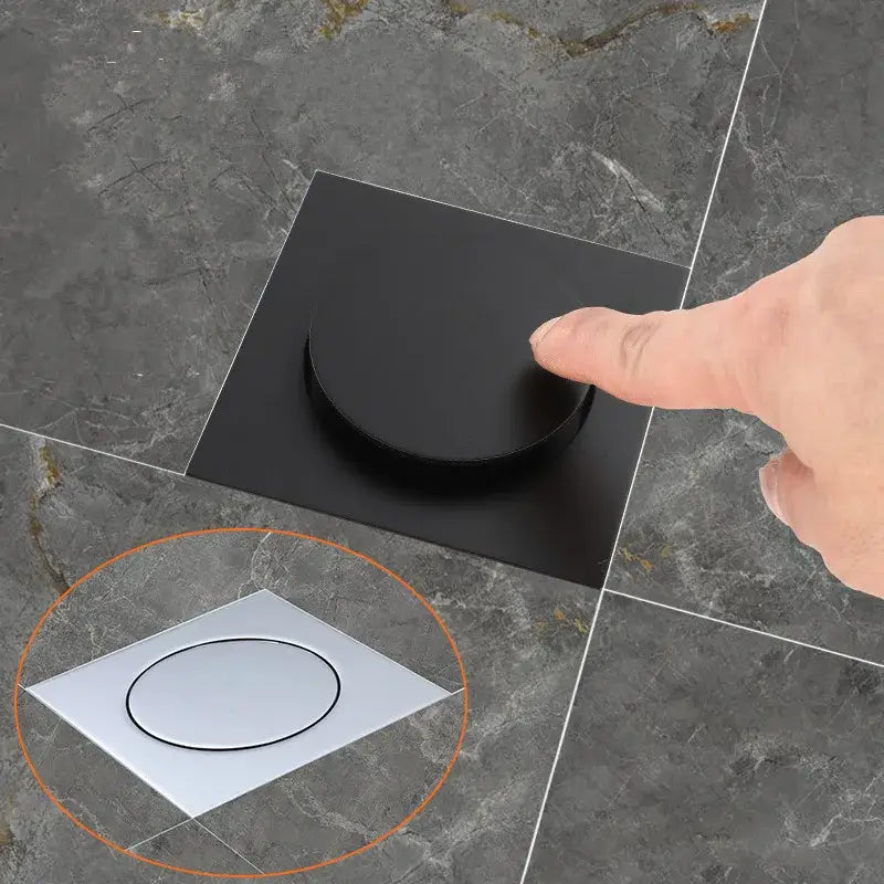 Black square flush-mounted brass shower floor drain with circular matte lid for modern bathroom decorbites brass shower