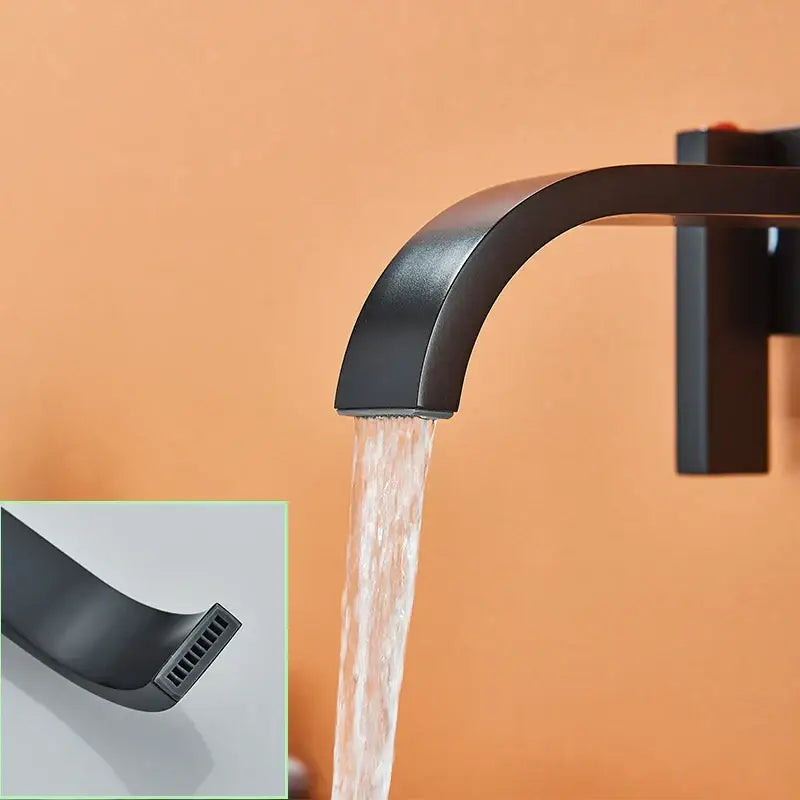Modern matte black brass wall mounted basin faucet with sleek curved spout and waterfall design by decorbites black brass