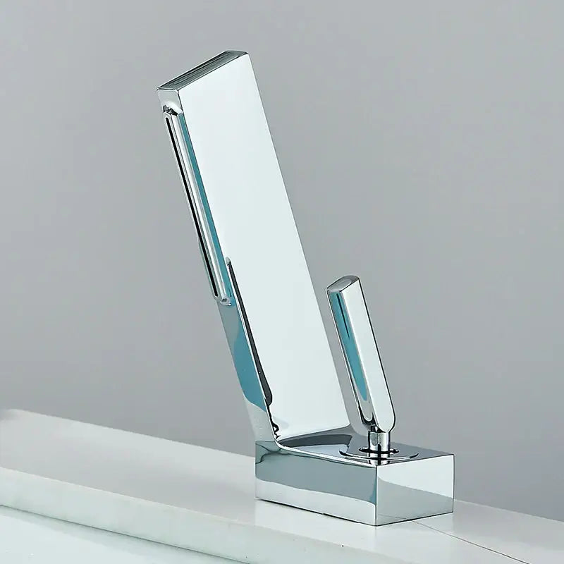Modern chrome-finished basin faucet with sleek angular design and single handle for decorbites brass waterfall basin use