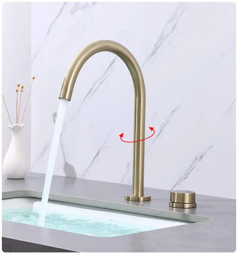 Modern brass-finished basin faucet with a sleek curved spout and minimalist design for decorbites brushed gold style