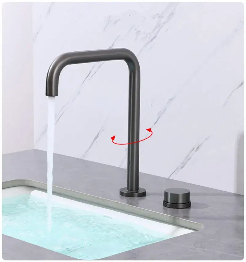 Modern matte black basin faucet with sleek curved spout and brushed gold decorbites handle for kitchen use
