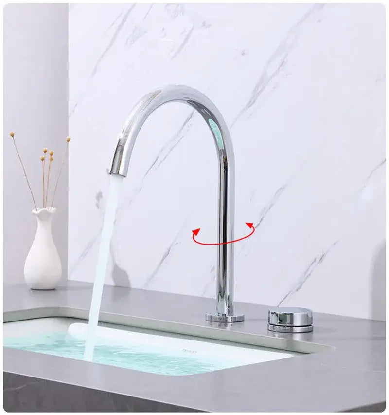 Modern chrome finished basin faucet with sleek arched spout and single handle for temperature control decorbites brushed gold