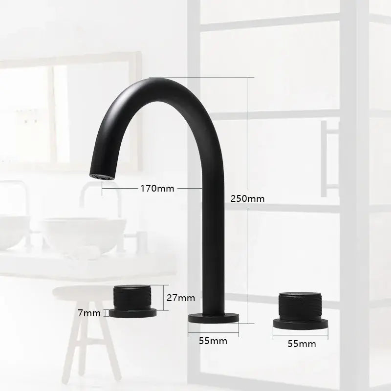 Modern matte black basin faucet with curved spout and cylindrical base complements brushed gold basin faucets