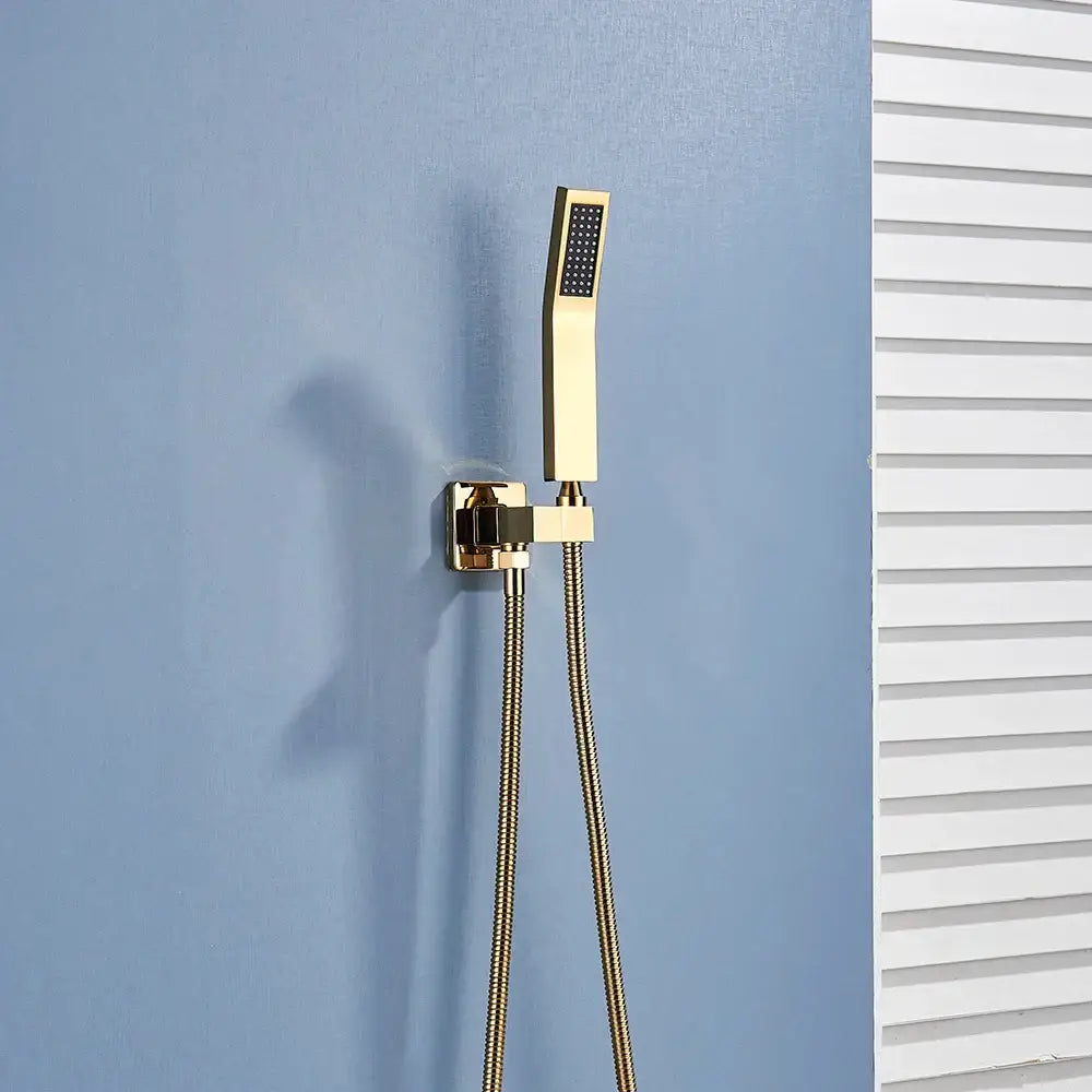 Gold-finished modern handshower head with textured spray face and matching wall bracket in decorbites black abs design