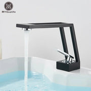 Modern matte black and chrome waterfall basin sink faucet with brass basin sink accents for stylish bathroom decorbites brass basin