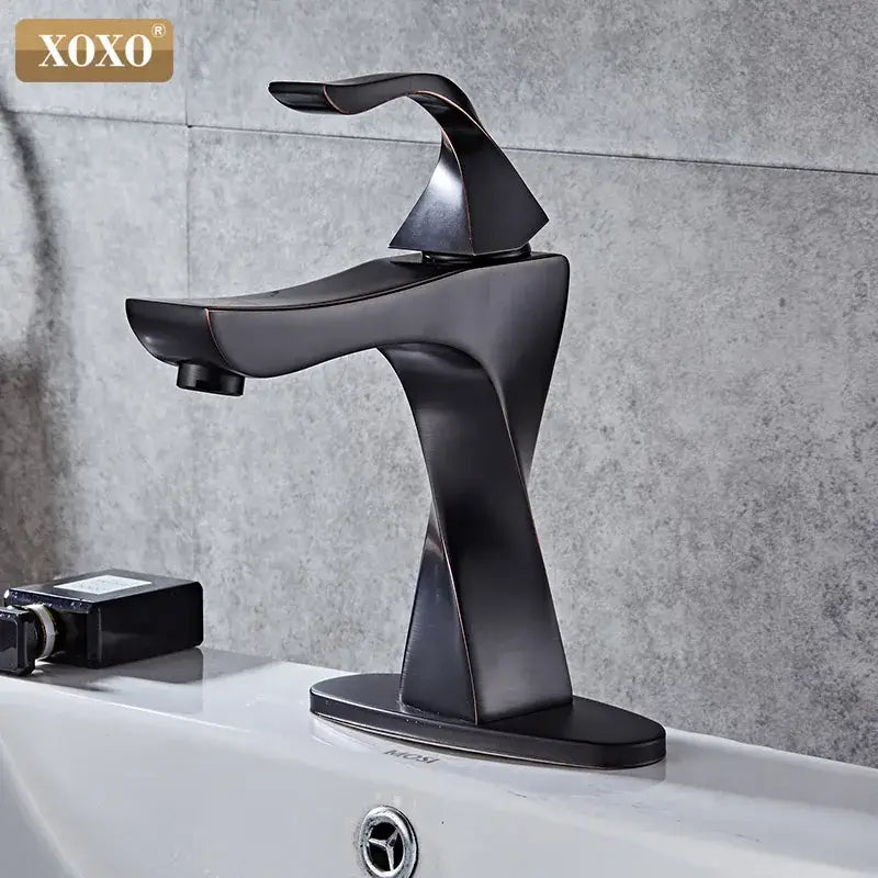 Modern matte black decorbites contemporary brass basin faucet with sleek angular contours for bathroom mixer use